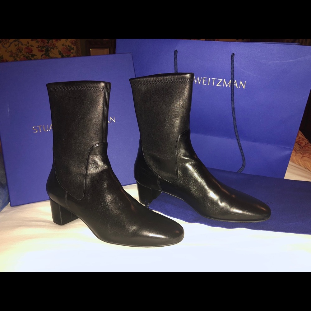 New black leather boots designer. Authentic